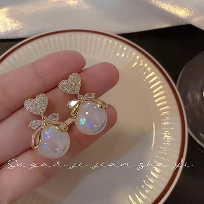 Delicate Gold Bow Heart Zircon Earrings – Elegant Colored Pearl Drop Design